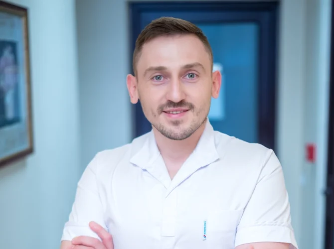 Dr. Marius Goman